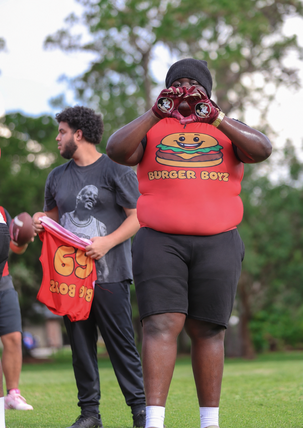 Damarion Phillips wearing his Burger Boyz uniform on the football field